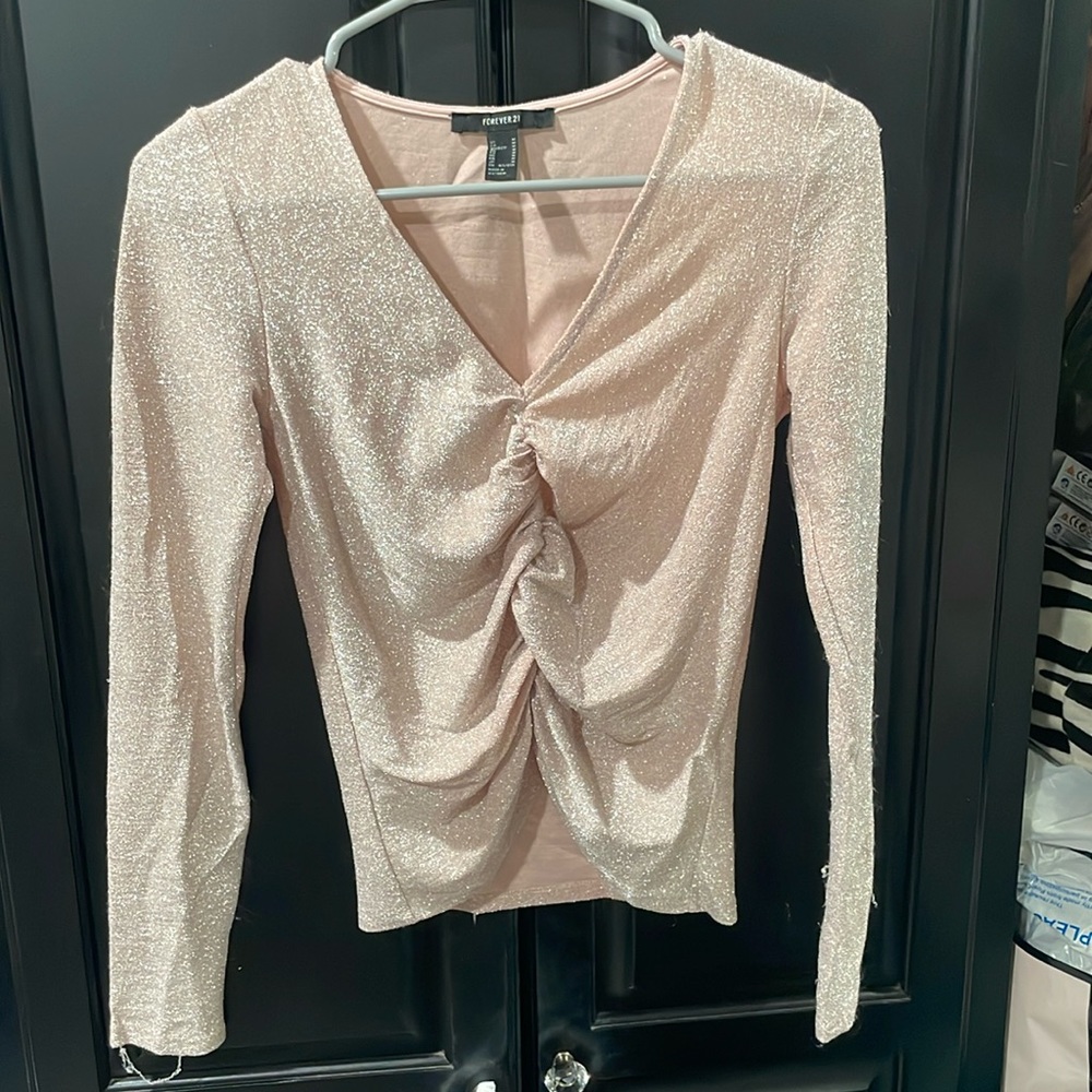 Shinny pink top it does mess up fast but still looks cute